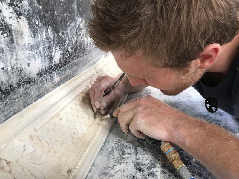 Worker Detailing Cornice — Manufacturing Cornices in Logan Village, QLD