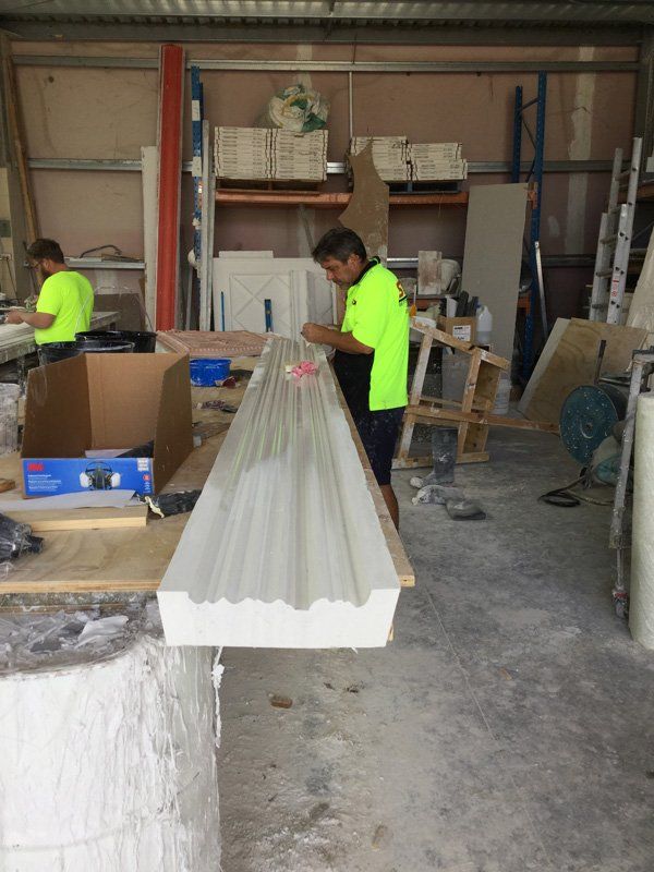 Workers Working on Cornice — Manufacturing Cornices in Logan Village, QLD