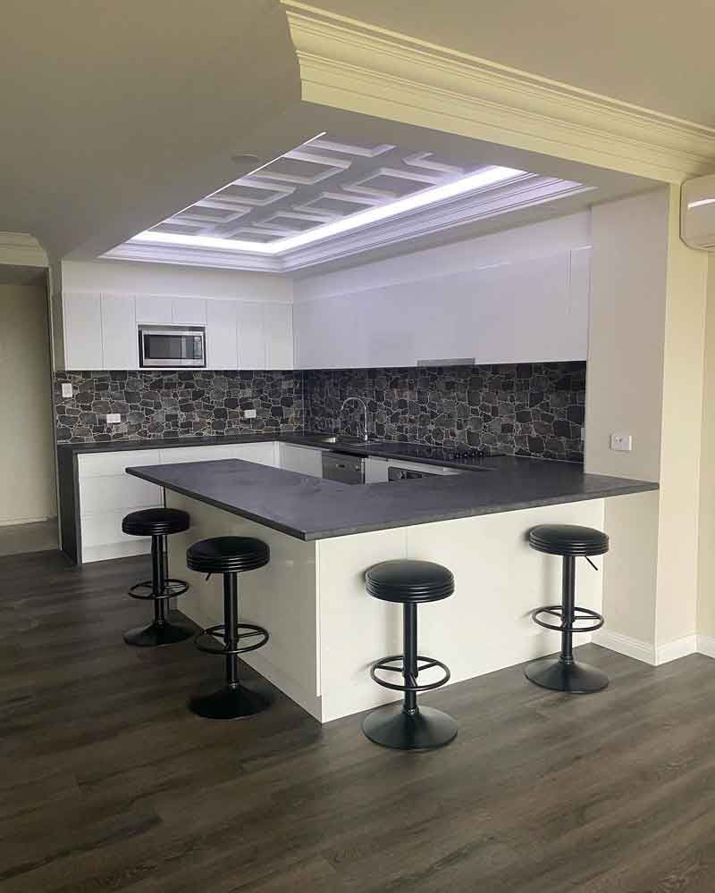 Four chairs in kitchen — Manufacturing Cornices in Logan Village, QLD