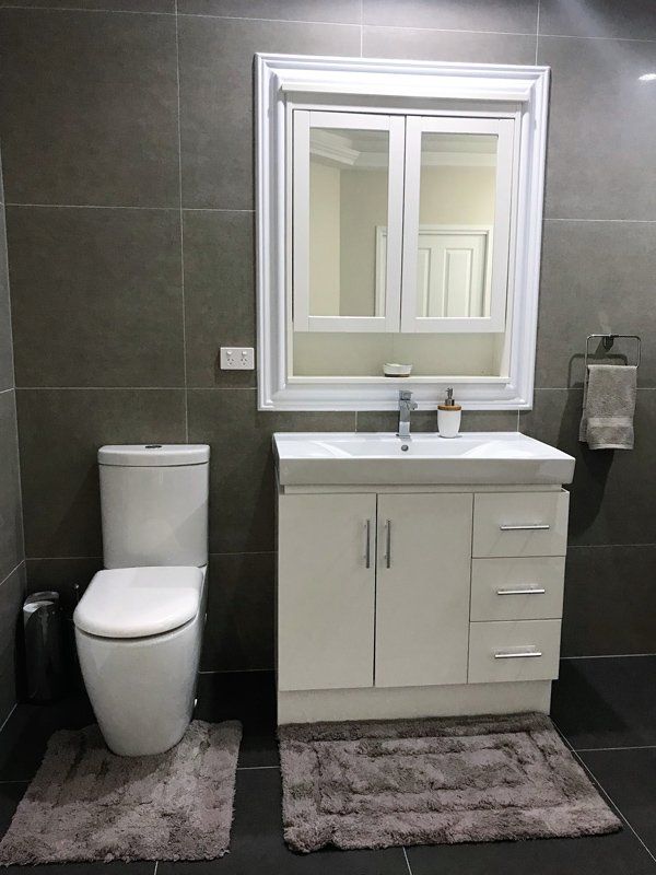 Elegant Bathroom Renovation — Manufacturing Cornices in Logan Village, QLD