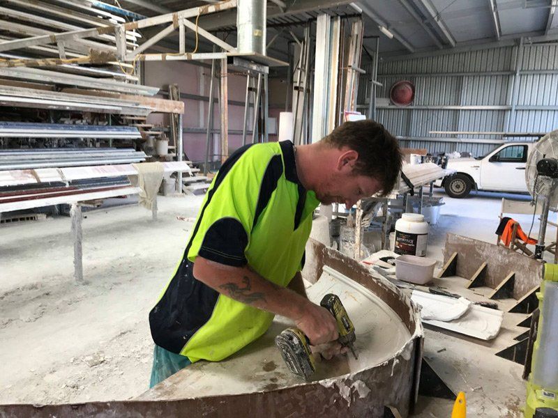 Working on Curved Cornice — Manufacturing Cornices in Logan Village, QLD
