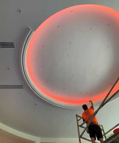 Ceiling with red light — Manufacturing Cornices in Logan Village, QLD