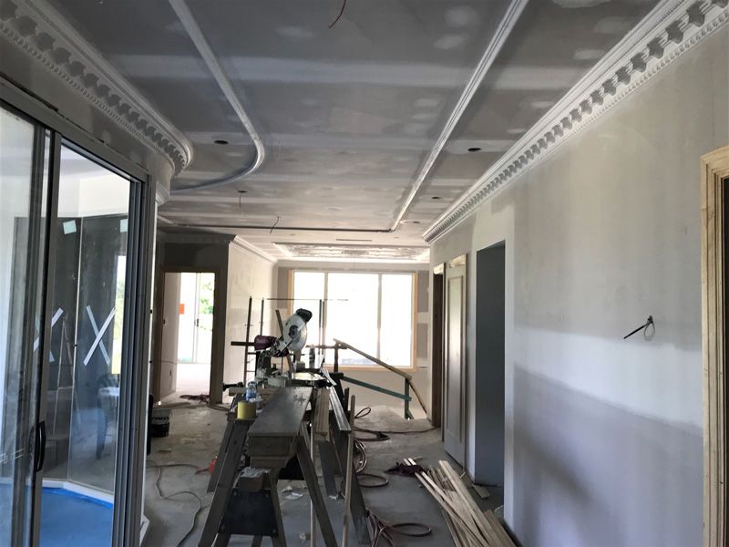 Workers maintaining site — Manufacturing Cornices in Logan Village, QLD