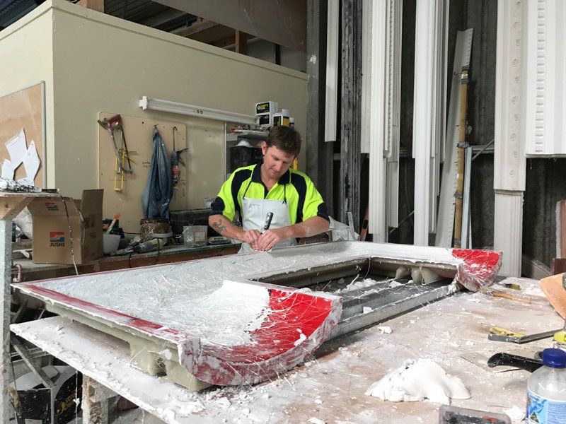 Worker Working the Cornice — Manufacturing Cornices in Logan Village, QLD