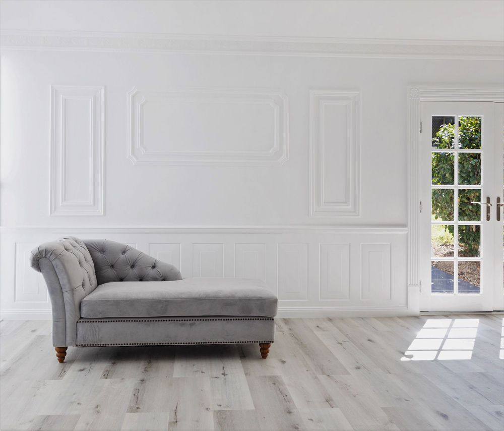 White room with sofa — Manufacturing Cornices in Logan Village, QLD