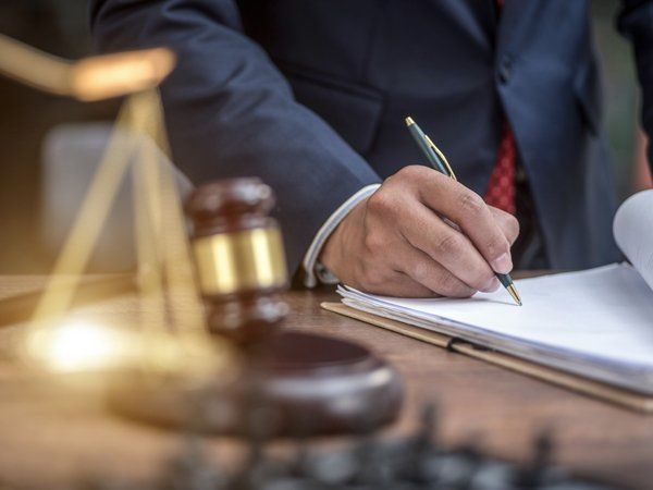 Attorney Signing Papers — Naperville, IL — Heitz & Bromberek, Ltd.