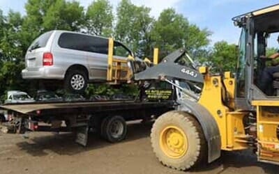 Truck Lifting the Car — Auto Repair in Milwaukee, WI