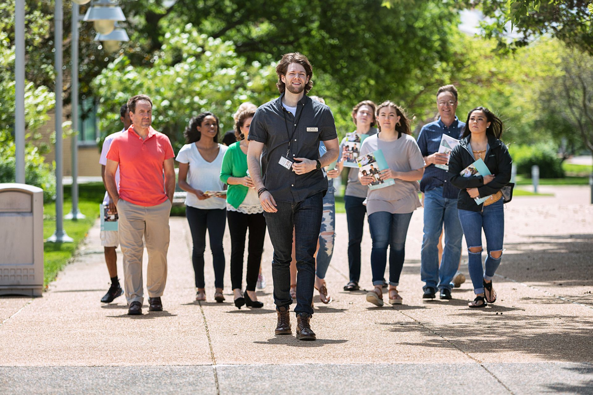 A group of people taking a campus tour.