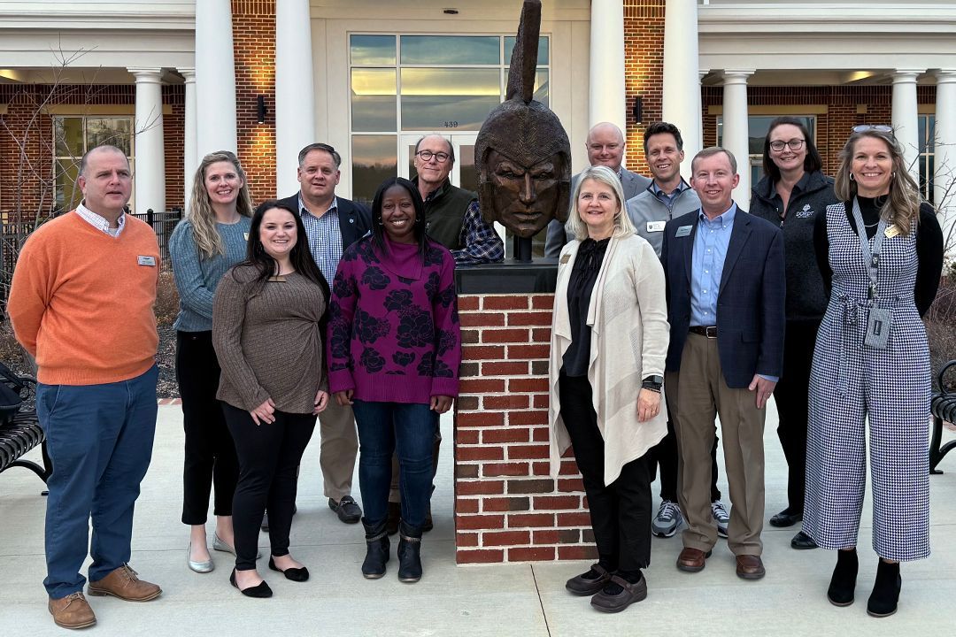 A group of ABACC peers pose during their group visit.