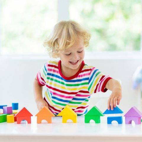 Boy Playing With Tower Blocks — Maitland, FL — Beckman & Associates Inc.