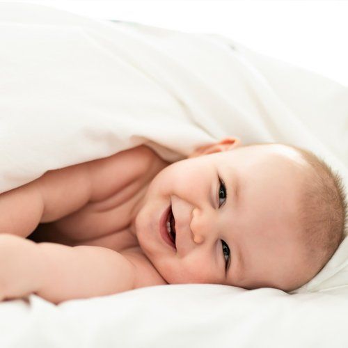 Little Baby Boy Smiling — Maitland, FL — Beckman & Associates Inc.