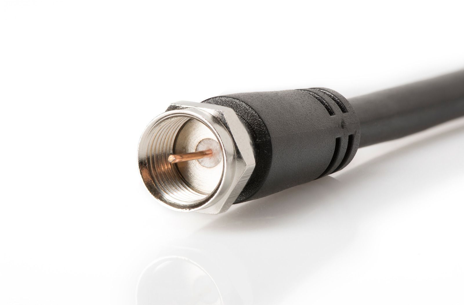 A close up of a cable with a copper connector
