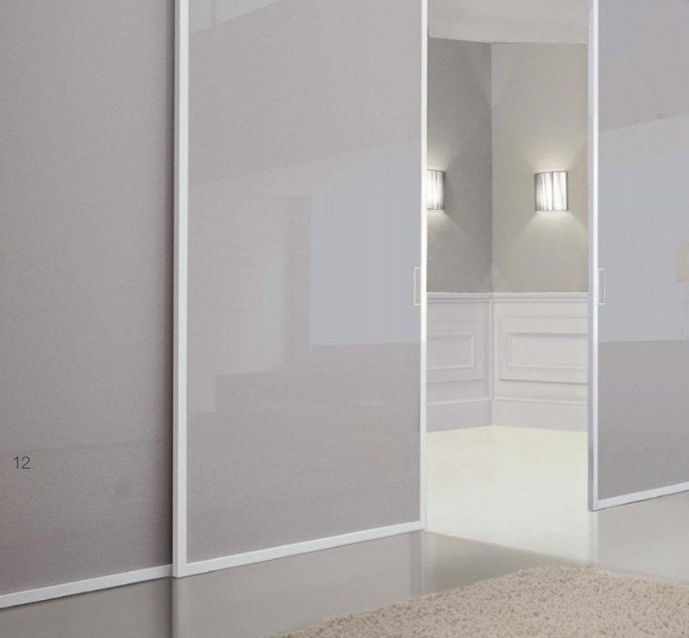 Porta scorrevole con vetrata