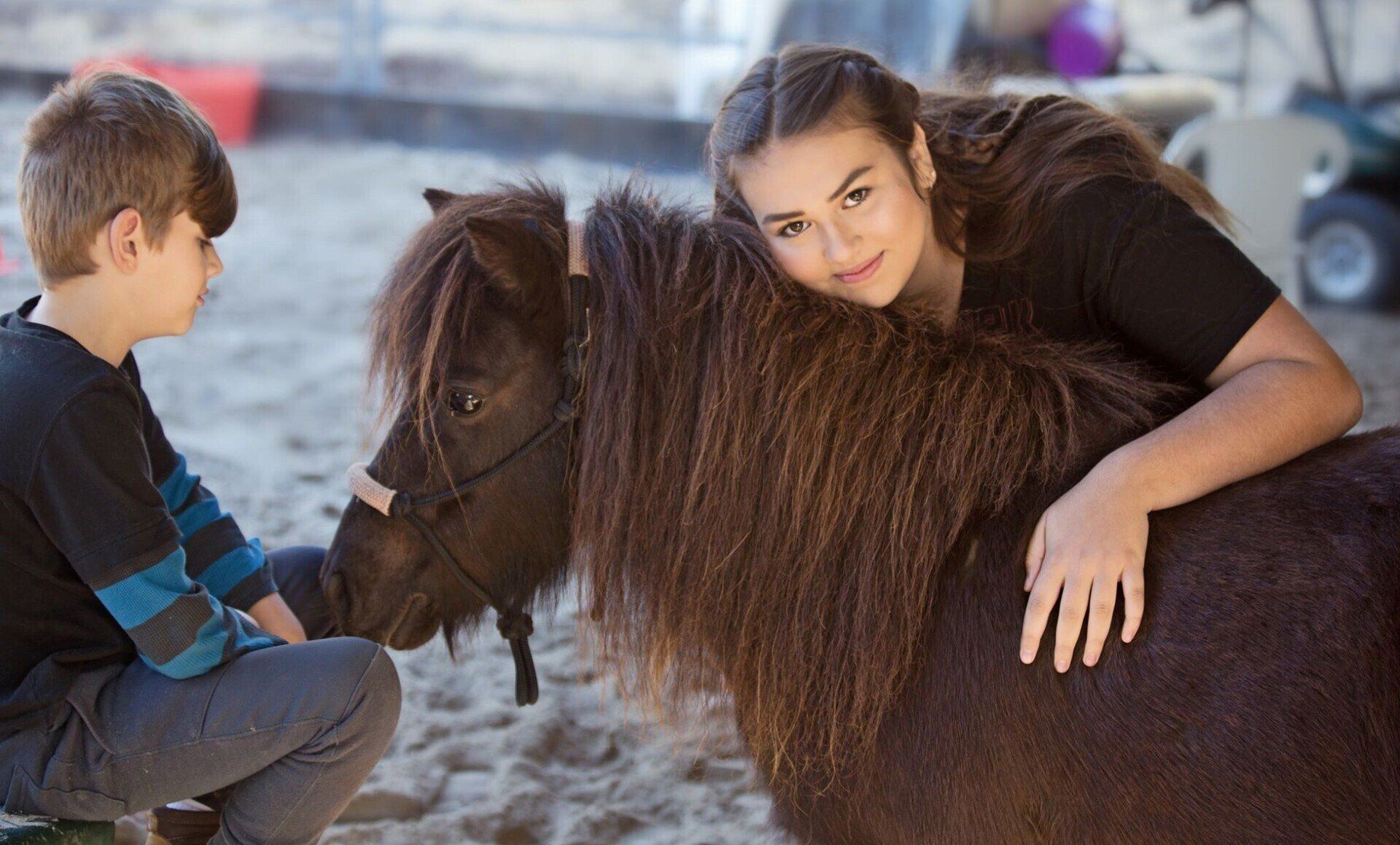 Girl hugging horse from Horses Inspiring Humans