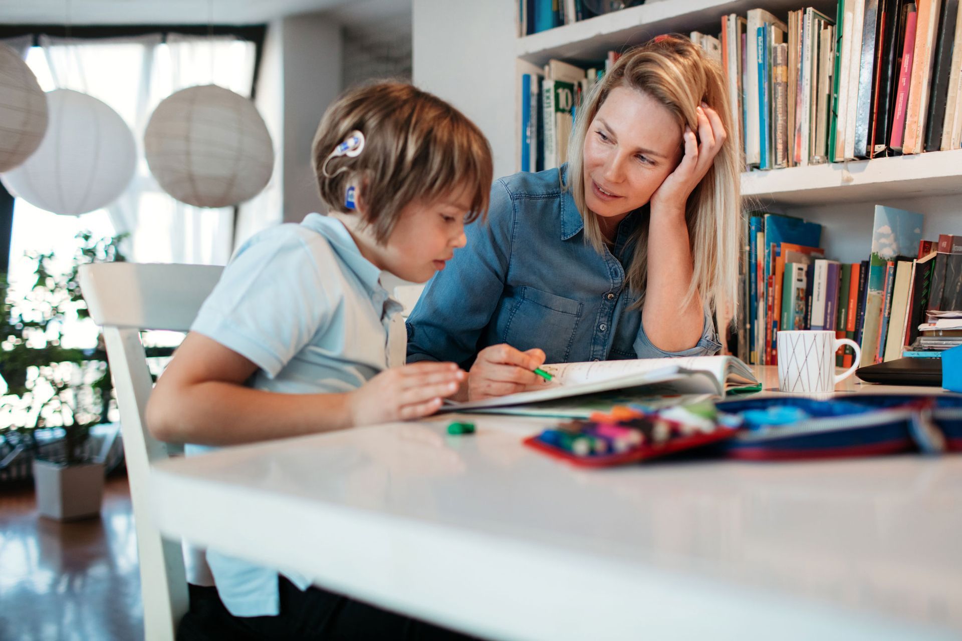 Mother and Her Son Doing Homework — Redcliffe, QLD — Achieve Disability Supports