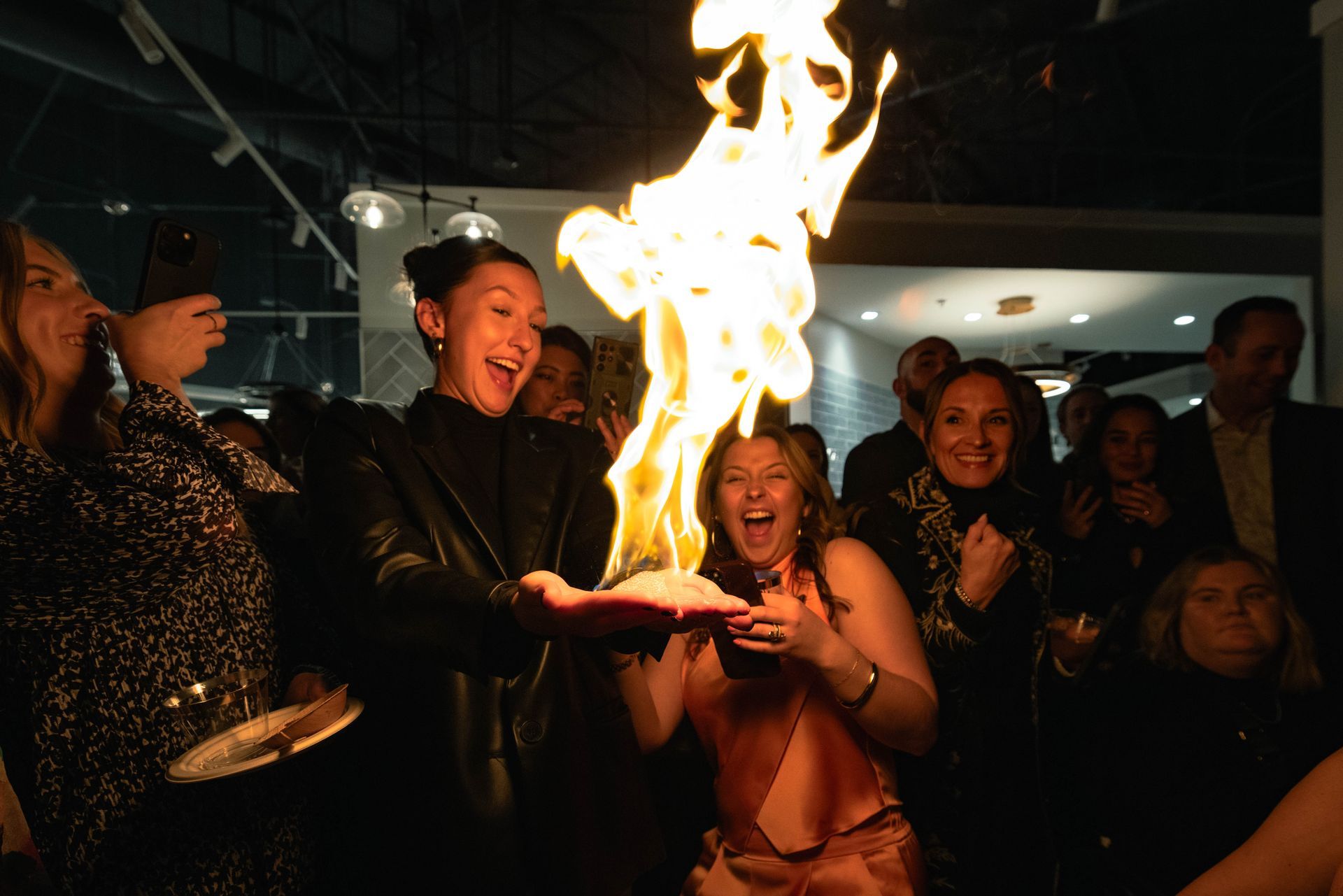 Excited women holding fire