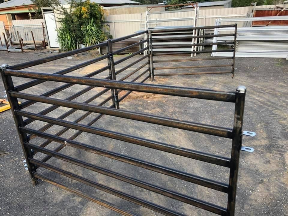 A Metal Fence Is Sitting on Top of A Dirt Field — Ballimore Welding in Parkes, NSW