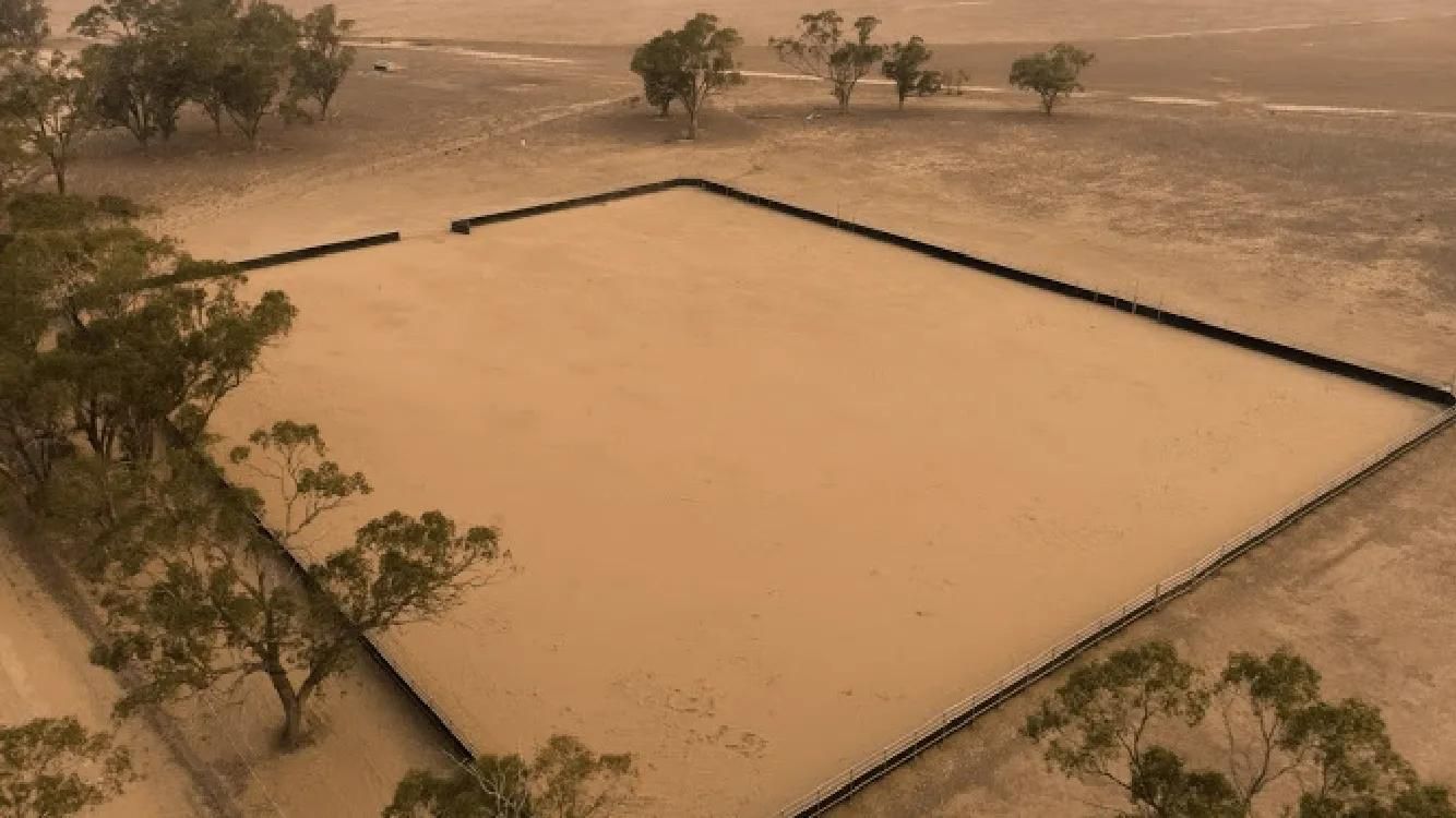 An Aerial View of A Flooded Field with Trees in The Background — Ballimore Welding in Ballimore, NSW