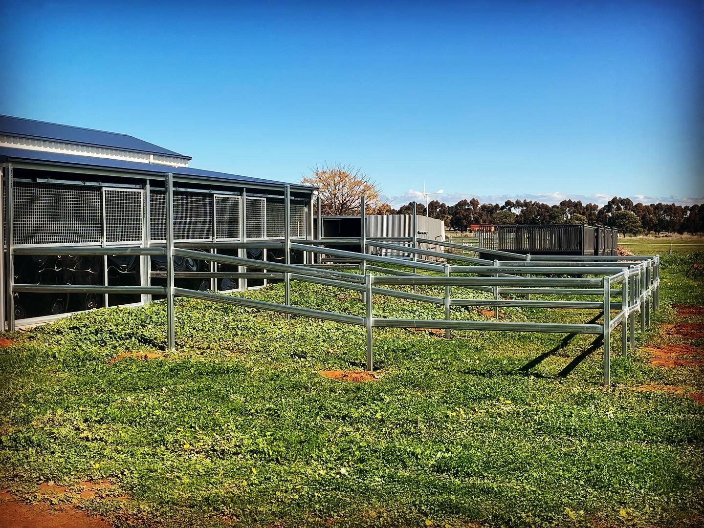 A Metal Fence Is Sitting in The Middle of A Dirt Field — Ballimore Welding in Ballimore, NSW