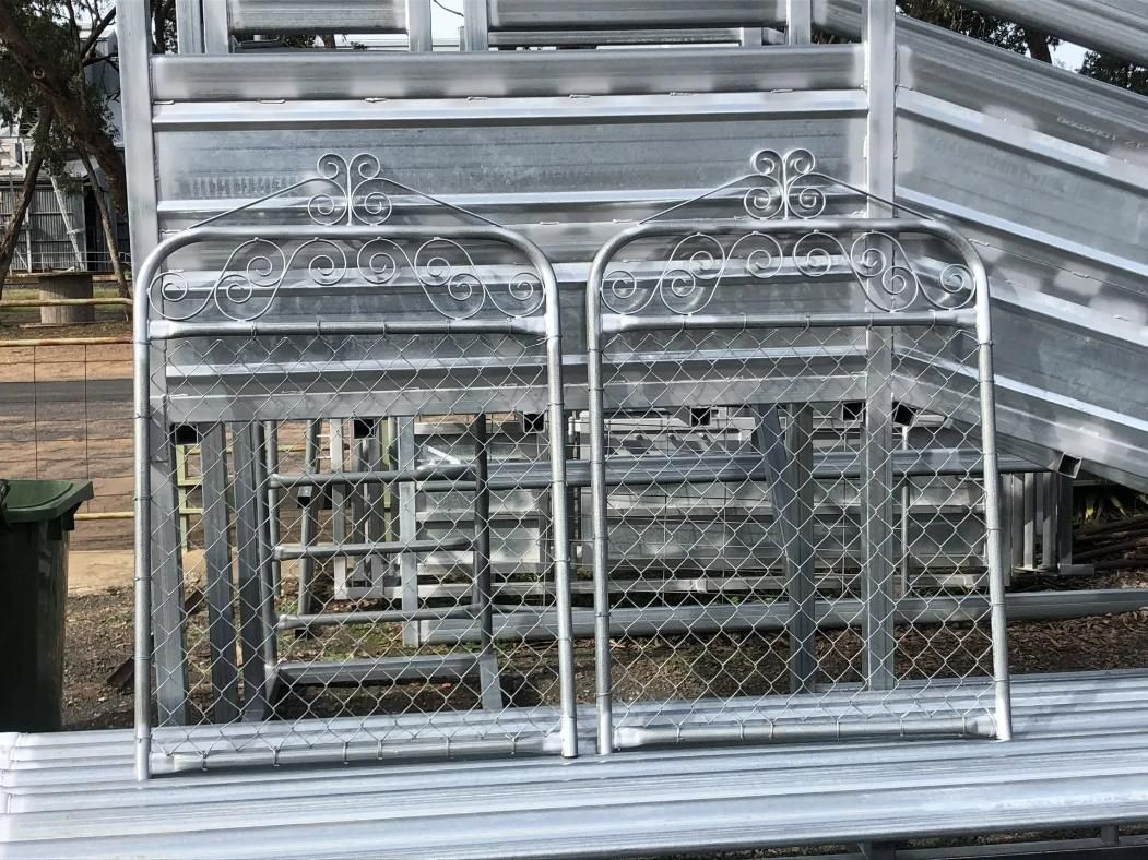 A Metal Fence Is Sitting on Top of A Wooden Bench — Ballimore Welding in Ballimore, NSW