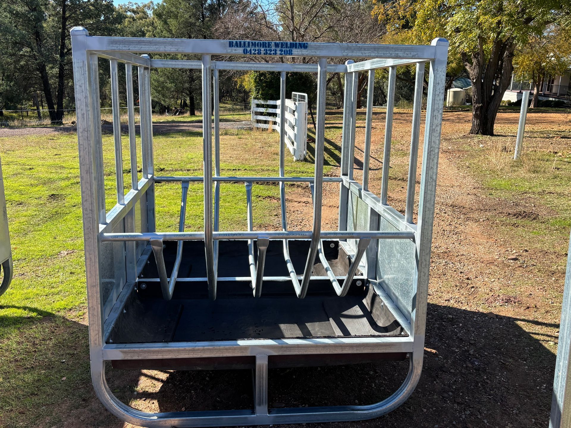 A Metal Fence Is Sitting on Top of A Dirt Field — Ballimore Welding in Ballimore, NSW