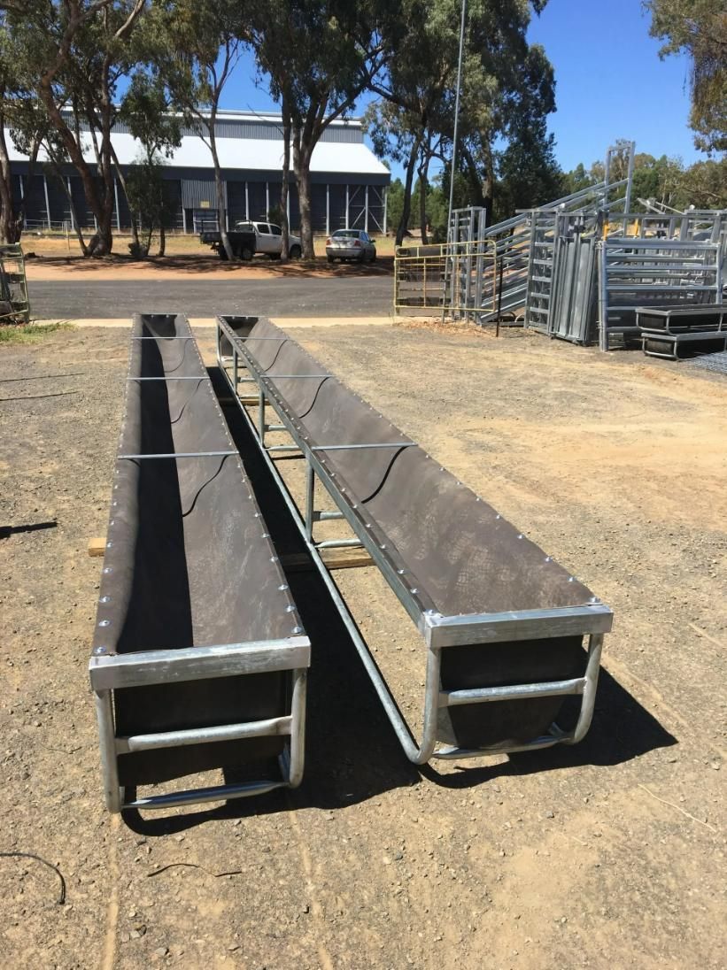 A Couple of Benches Sitting on Top of A Dirt Field — Ballimore Welding in Ballimore, NSW