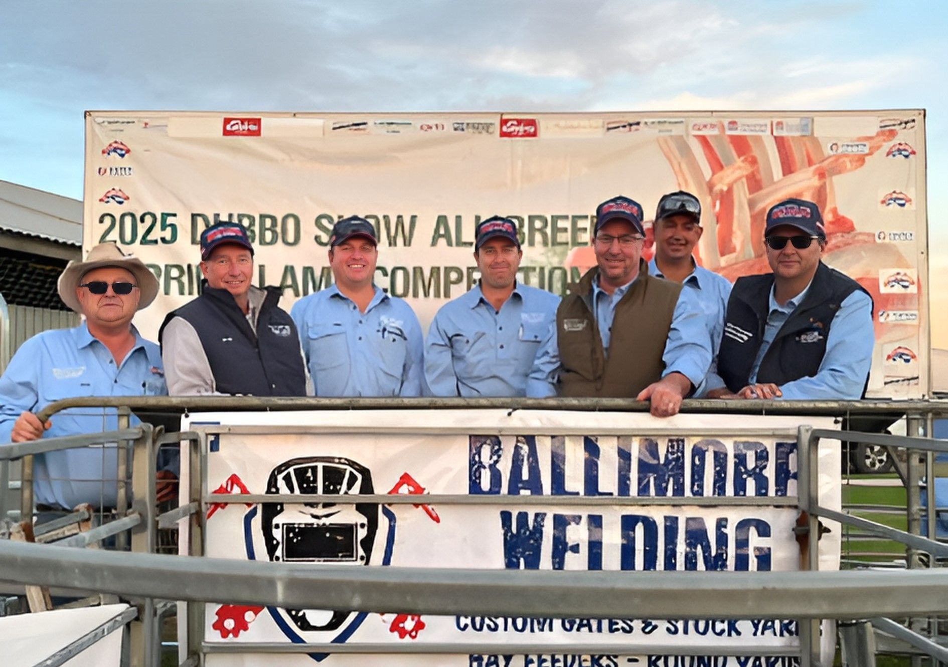 A Group of Men Standing in Front of A Sign that Says Ballimore Welding — Ballimore Welding in Ballimore, NSW