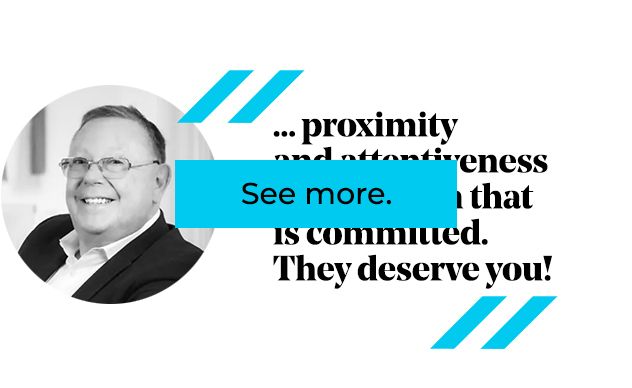 Man with glasses smiling, quote about commitment. Turquoise accents, 