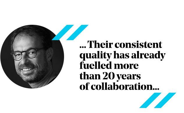 Man with glasses; quote about consistent quality and 20 years of collaboration.