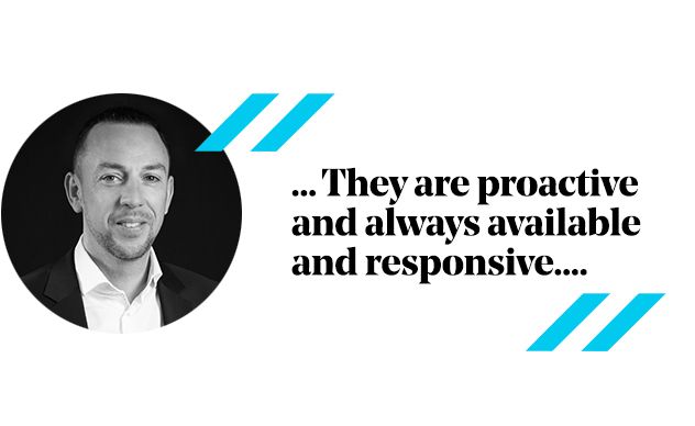 Man in suit, black and white circle. Quote: 