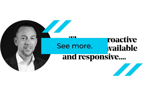 Man in a suit, headshot in a circle. Blue and white graphic with 