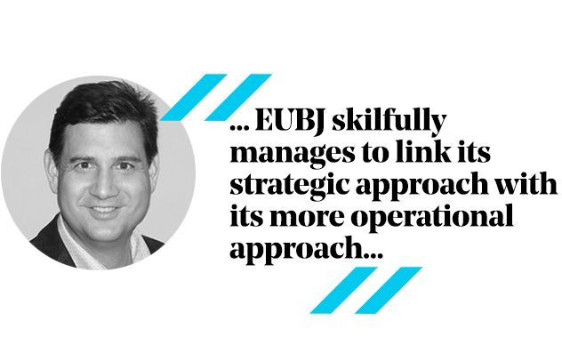 Man in a suit with a quote: 