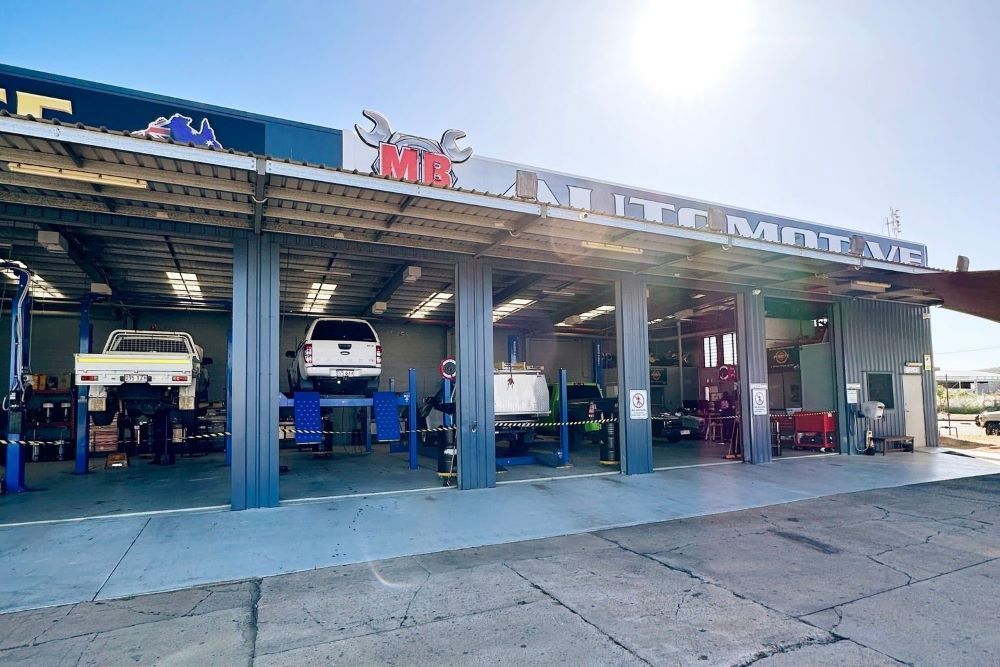 Vehicles being serviced by fleet mechanics