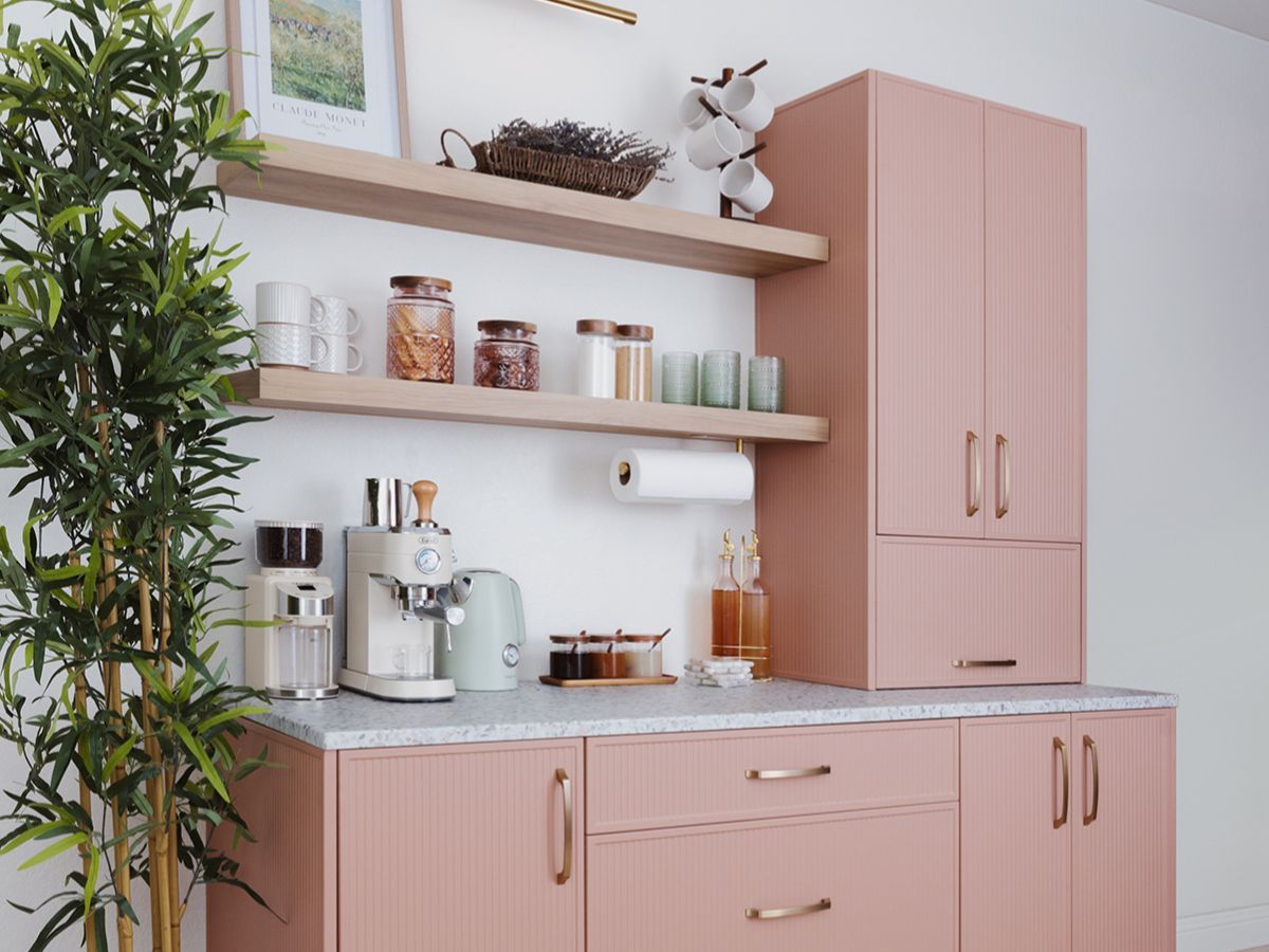 A reach in closet with gray shelving, drawers, and hanging rods for clothes. Clothing is organized by color.