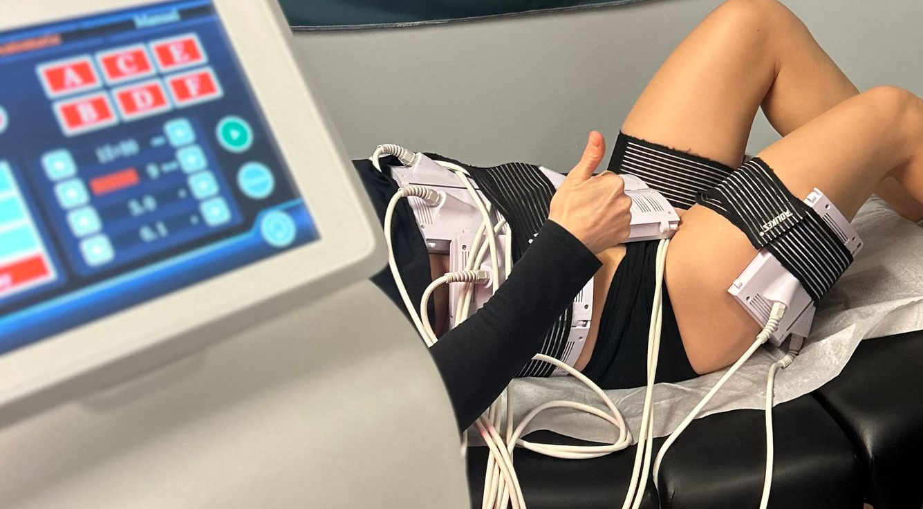 Laser Treatment On Woman's Face — Evans, GA — Evans Sport & Spine Chiropractic Center