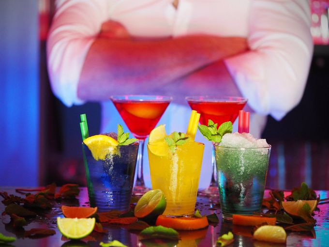 Table Filled With Colorful Cocktails