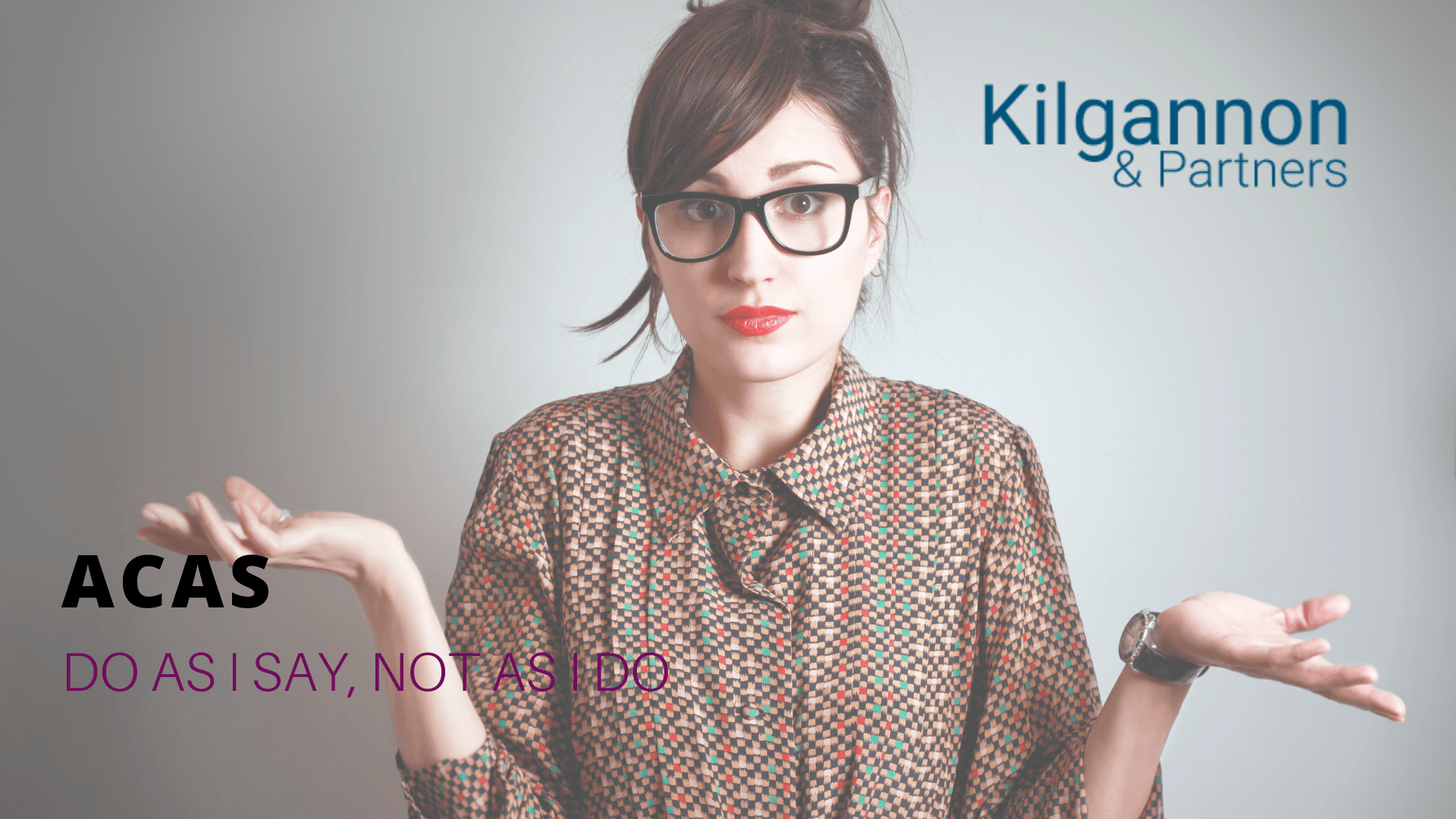 A person with glasses shrugs in front of text reading 