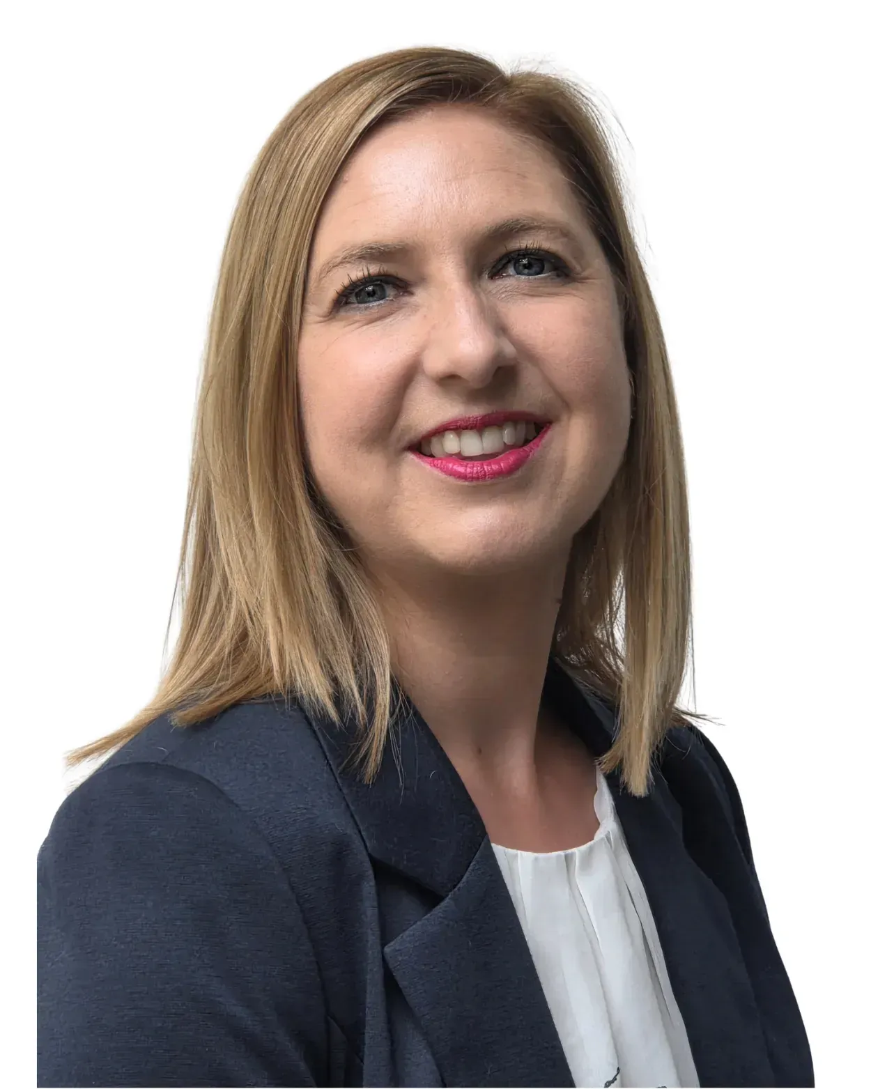 A person with shoulder-length blonde hair wearing a navy blue blazer and white blouse, smiling against a white background.