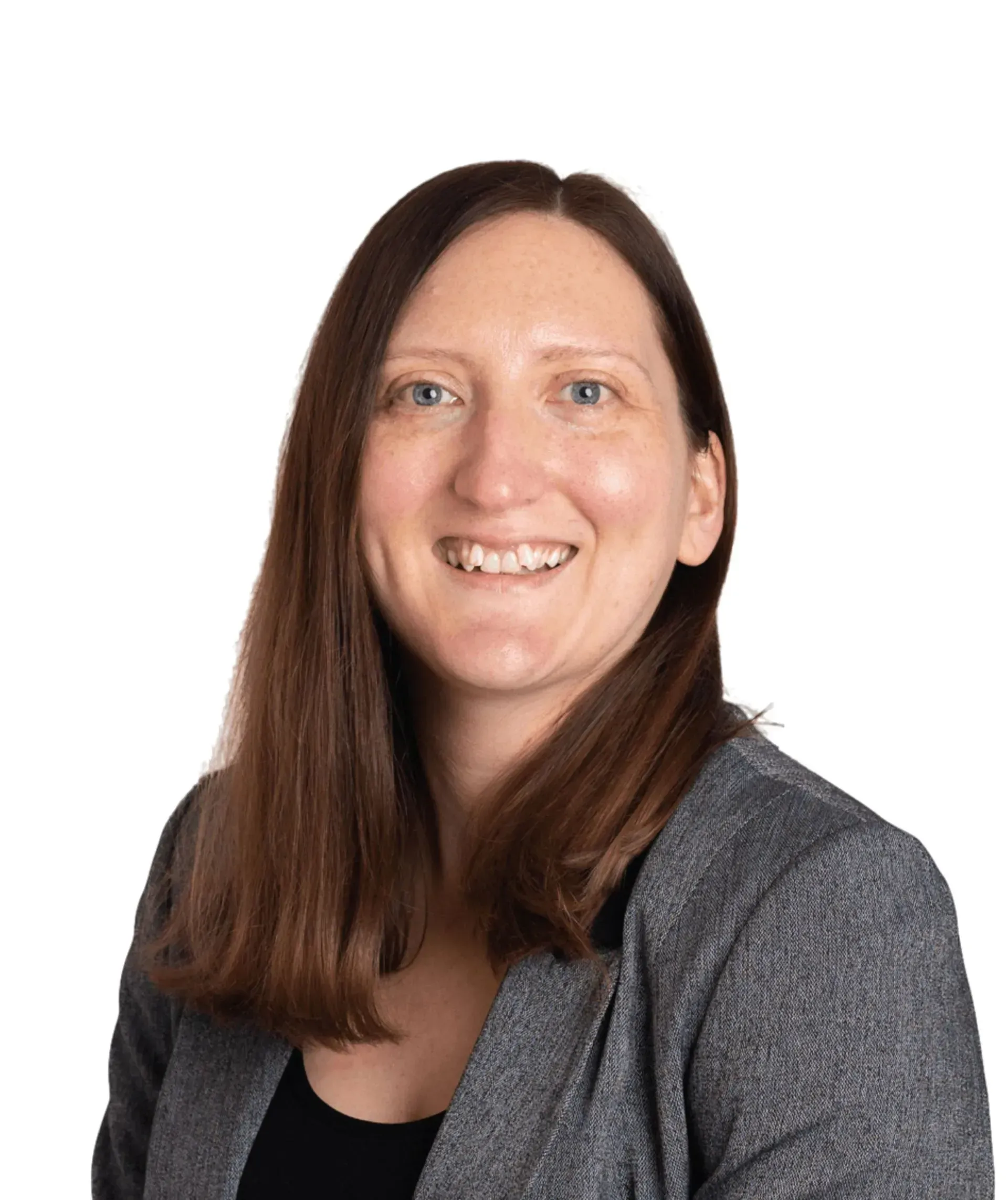 A smiling person with long dark hair, wearing a gray textured blazer over a black top, against a white background.