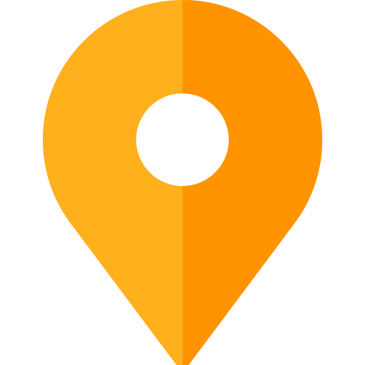An orange pin with a white circle in the middle.