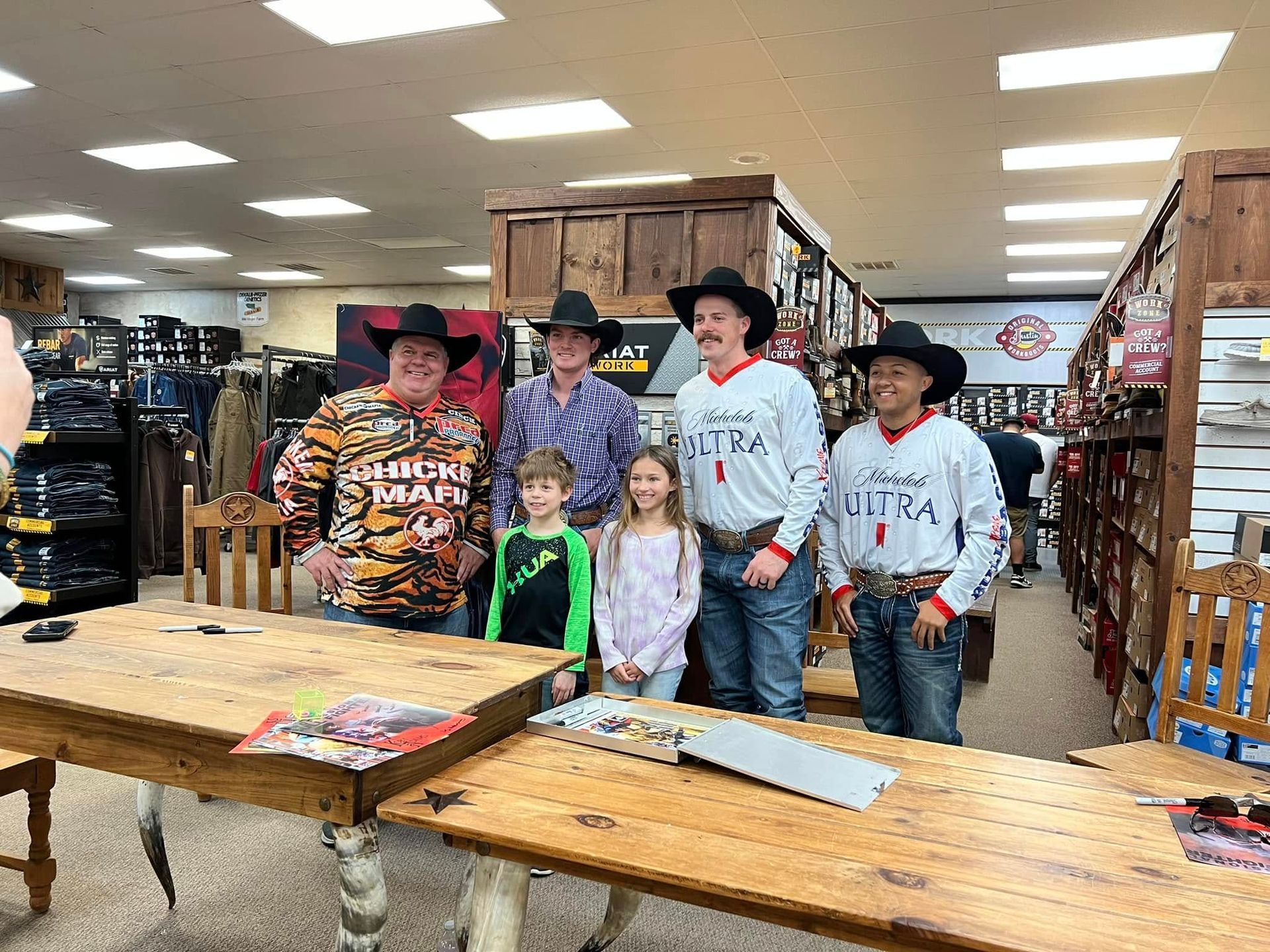 People in cowboy hats, some wearing 