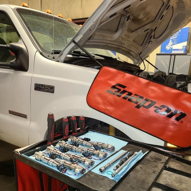 A Mechanic Is Working on the Engine | Jake's Automotive and Diesel Repair