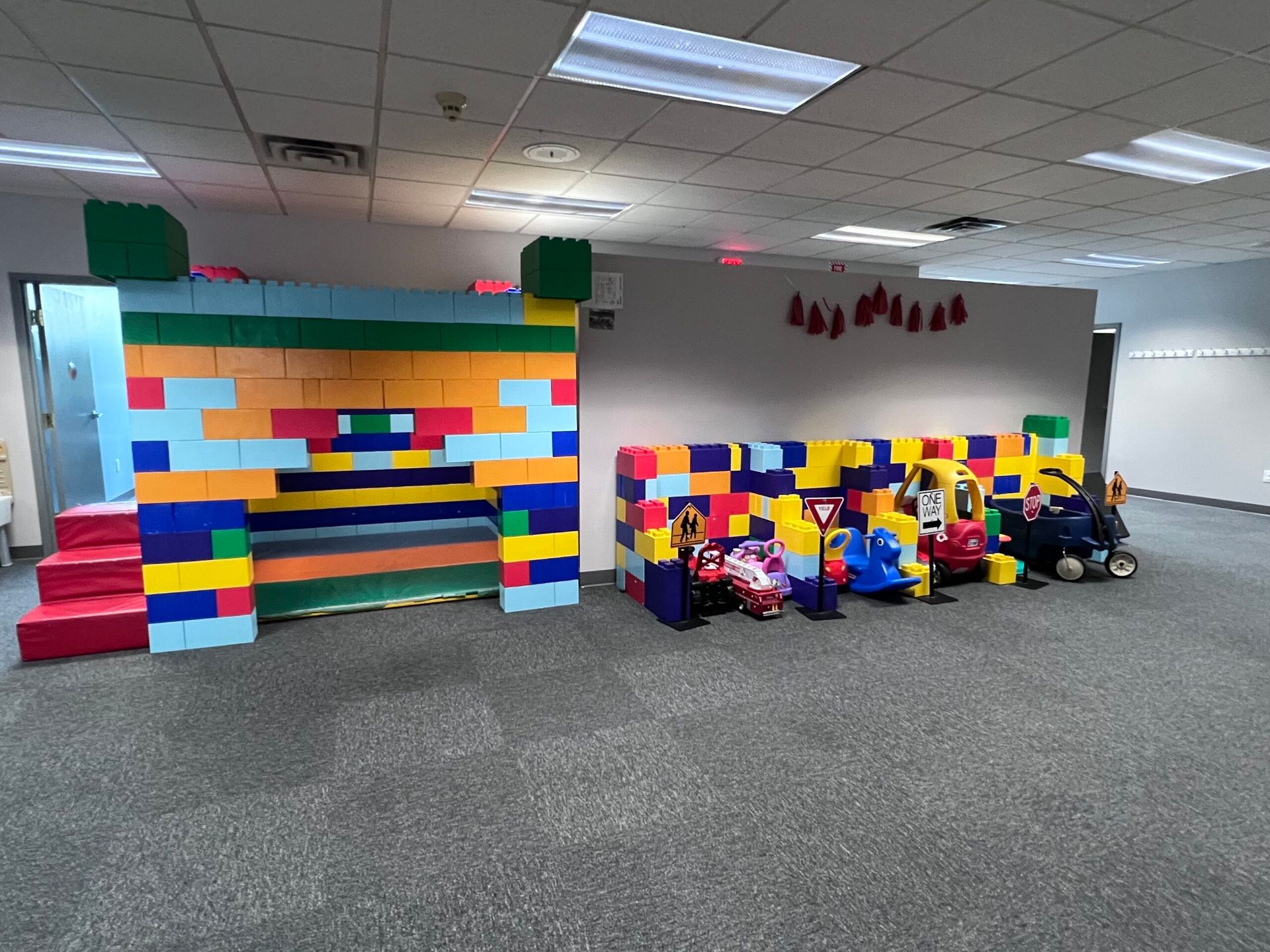 A room filled with lots of colorful lego blocks and toys.