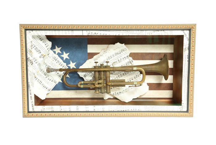 trumpet and sheet music in a custom box made at My Workshop Picture Framing in Houston, TX