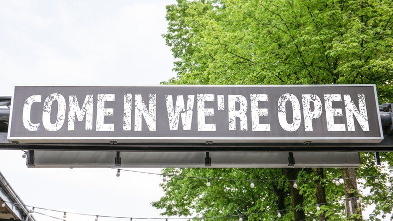 Come in we're open sign