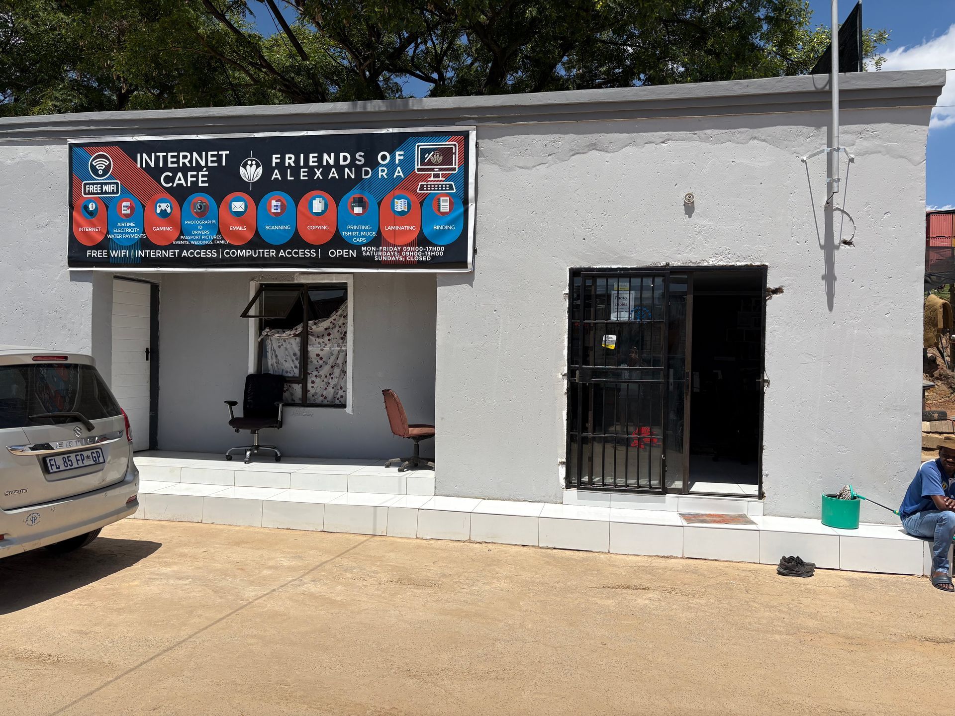 A white building with a sign that says inter cafe