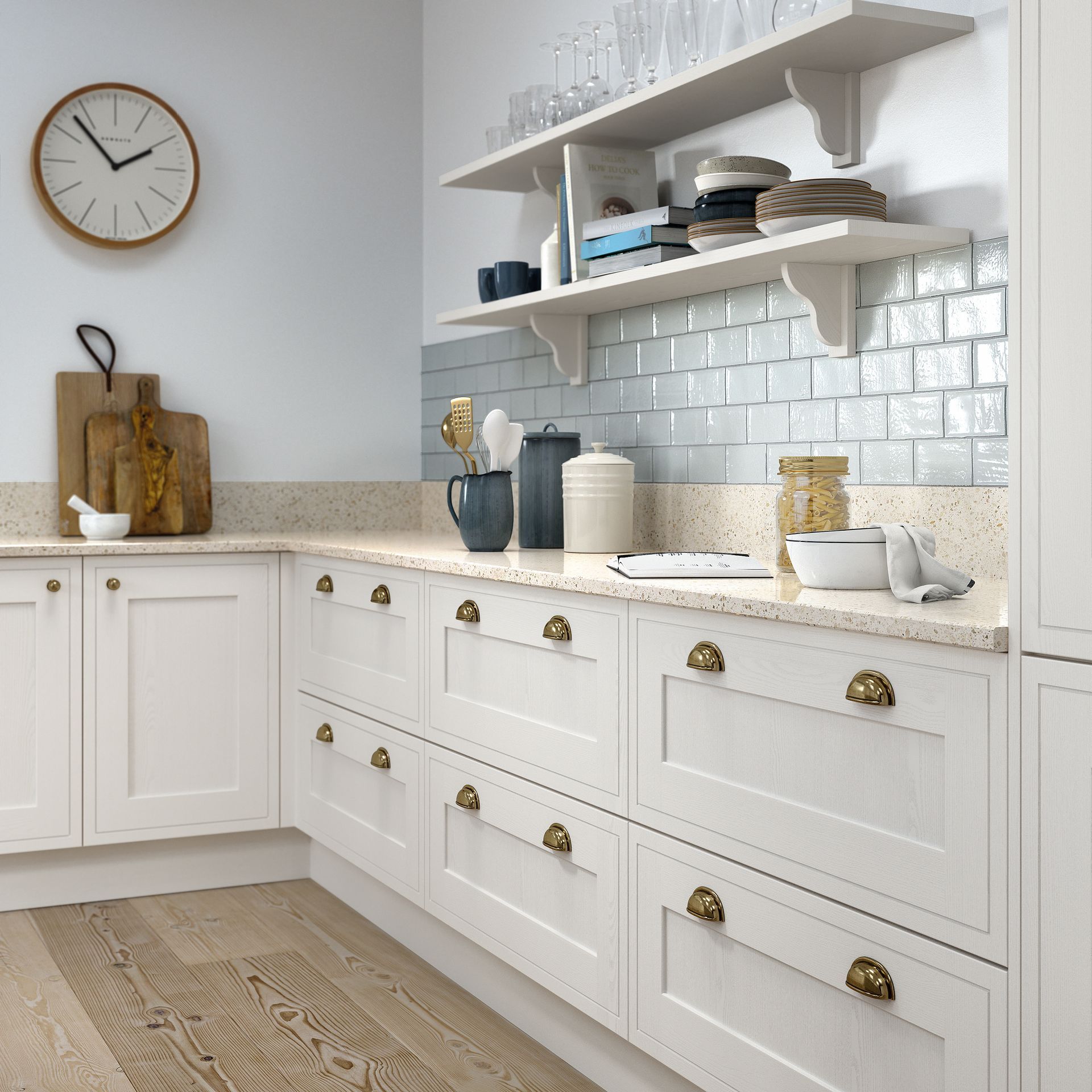 Chartwell Bone Drawers with cream worktop and pale blue tiles wooden chopping boards