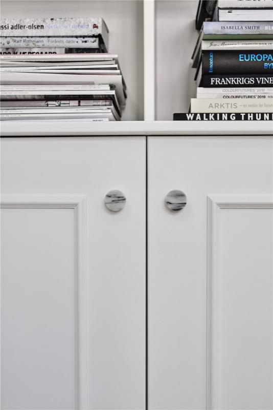 The Monte range is designed in marble on shaker white doors with books on top
