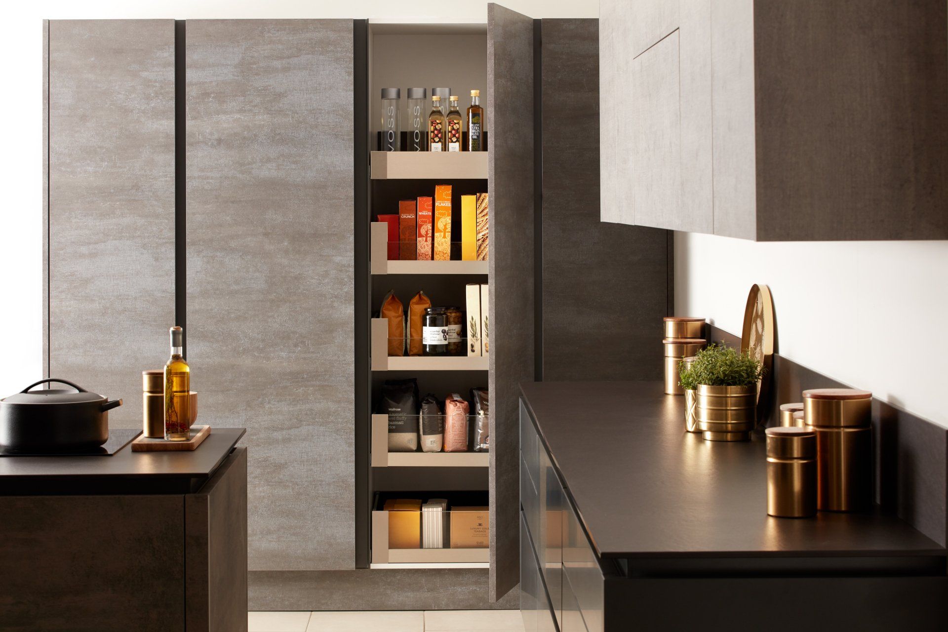 Otto Dark Textured Concrete tall larder unit with a blum space tower for pantry goods