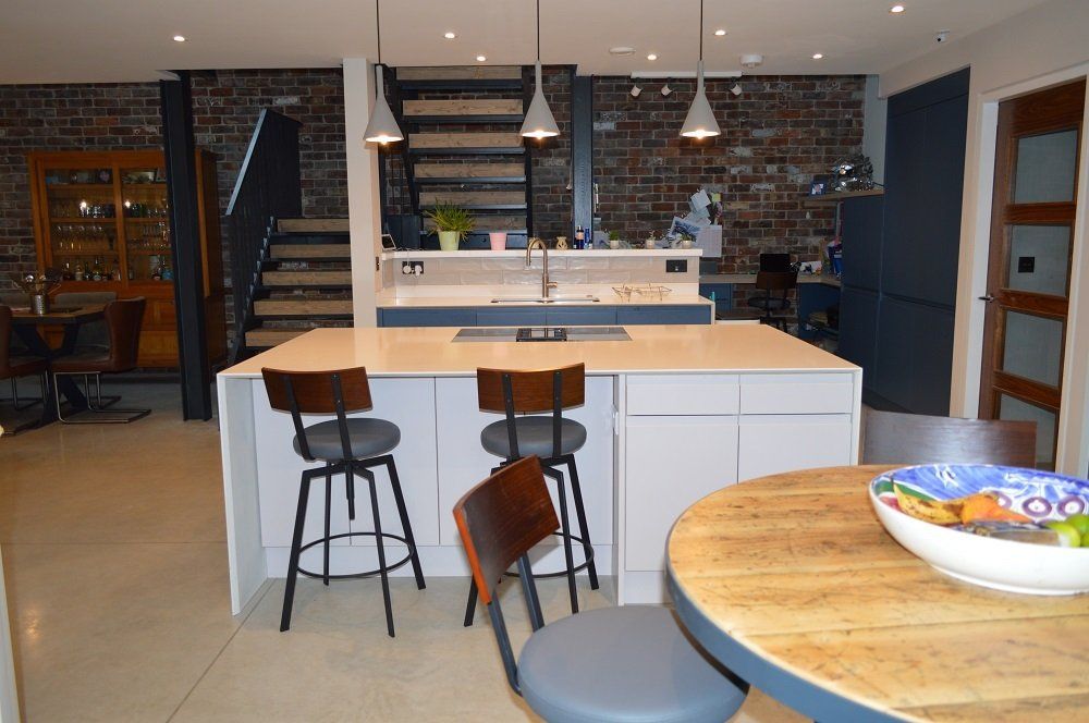 Valentino Kitchens Design Installation Wells Malmo handleless Old Navy shark nose quartz waterfall island